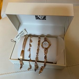 Anne Klein Rose Gold-Tone Bangle Bracelet Watch